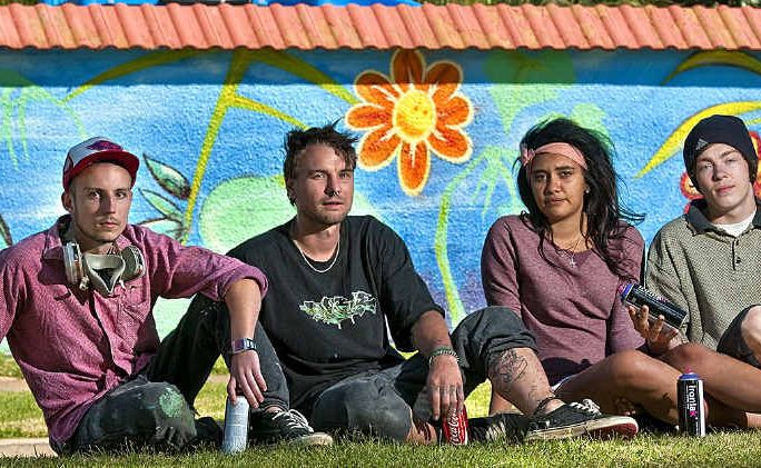 Taking a break from their artwork are (from left) Ian McCallum, Jason Parasyn, Allysia Dunn and Rodd Whicker.